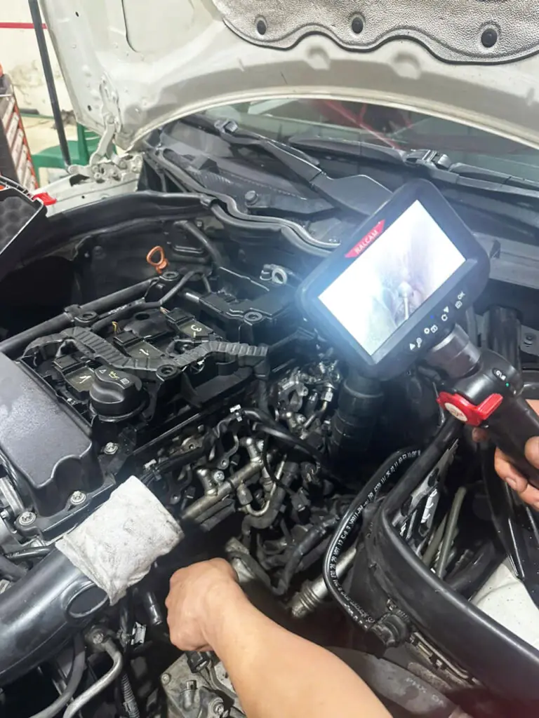 Vệ sinh họng nạp ô tô ảnh 2